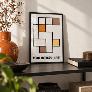 Geometric Abstract Art, a small A4 framed print leaning on a black metal shelf in a living room