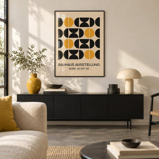 Geometric Bauhaus Poster, framed on the wall of a design-led city flat living room with a warm white wall and a polished concrete floor