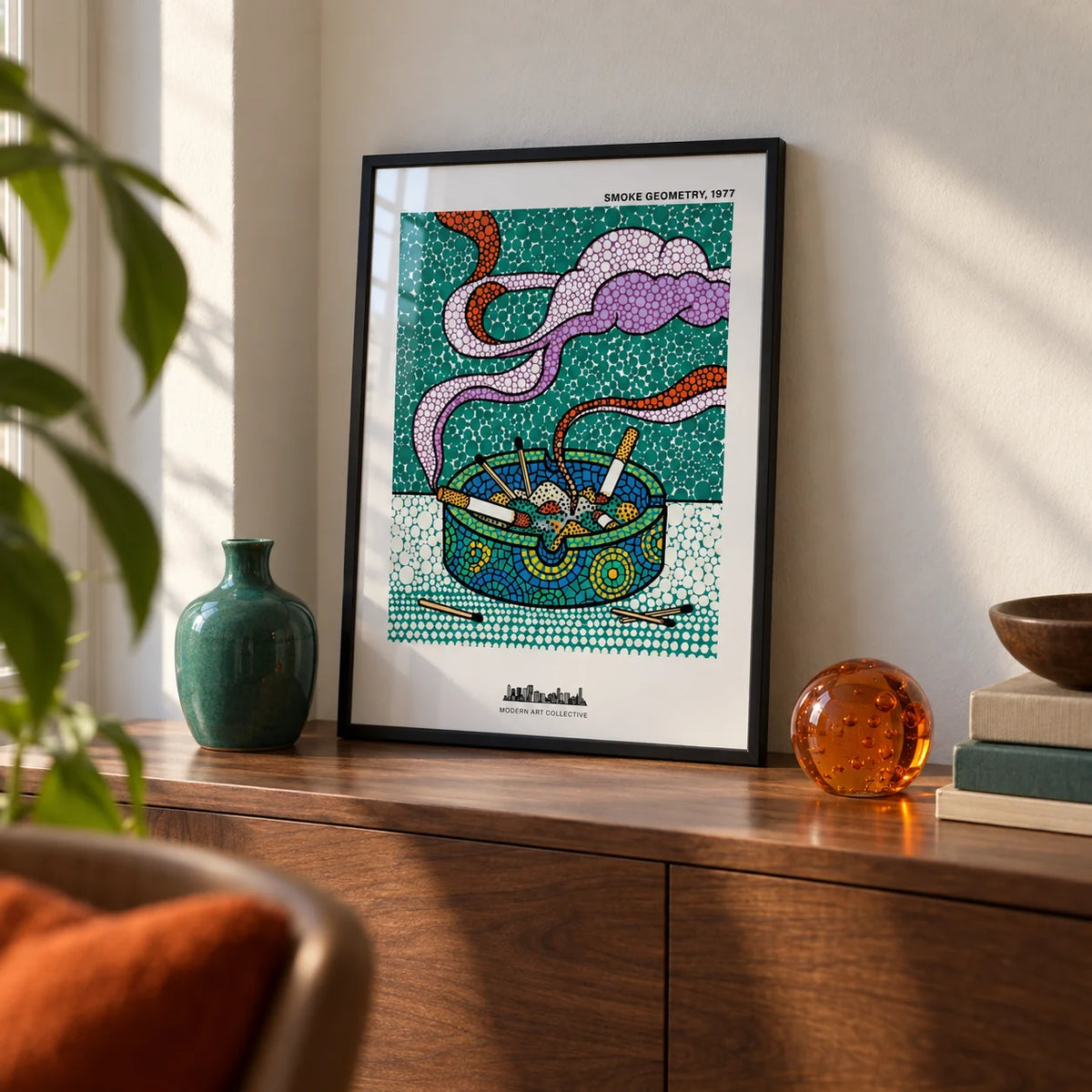 Geometric Smoke Art Print, a small A4 framed print leaning on a walnut sideboard in a living room