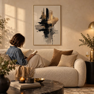 Gold And Black Poster, framed on the wall of a modern luxe living room with a warm beige plaster wall