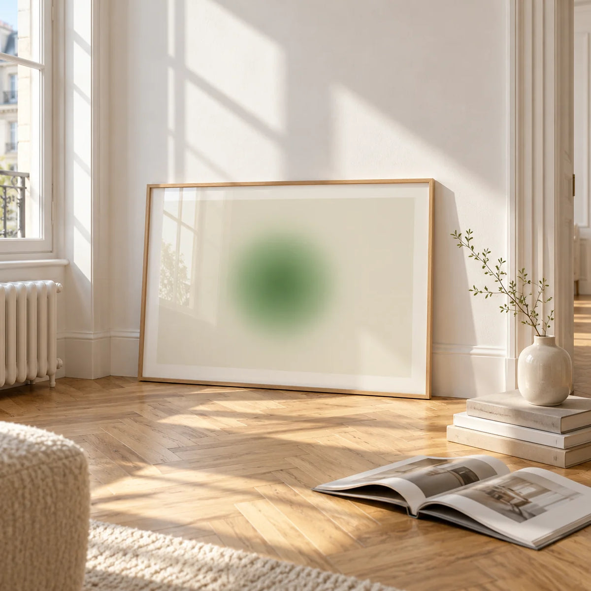 Green Aura Poster, framed and leaning on the parquet floor of a bright living room