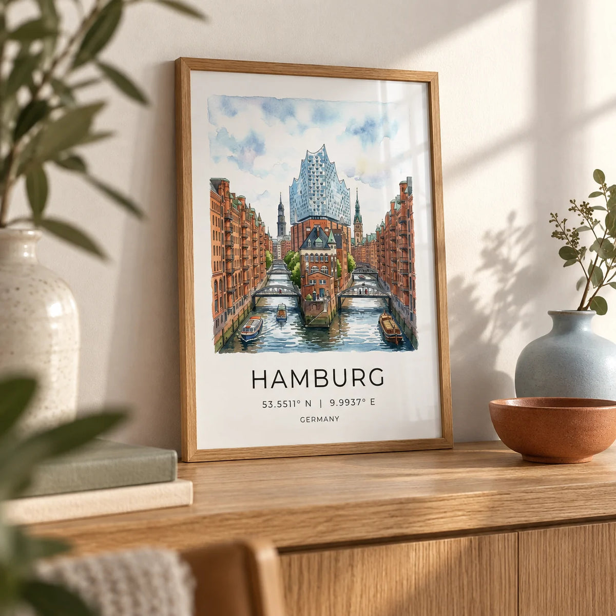 Hamburg Cityscape Art Print, a small A4 framed print leaning on an oak shelf in a living room