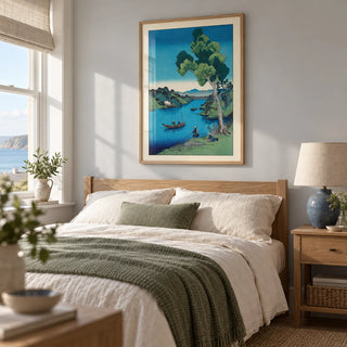 Hasui Kawase Bay Print, framed on the wall of a restful bedroom in a UK coastal home with a pale grey wall and natural oak furniture