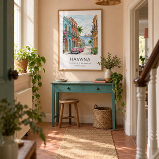 Havana Wall Art, framed on the wall of a welcoming hallway in a UK terraced home with pale peach plaster walls and a simple terracotta floor