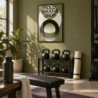 Home Gym Wall Art, framed on the wall of a spare room home gym with an olive green painted wall