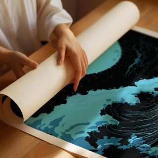 Detail close-up of large ocean wall art showing a blue wave and moon on a wooden table