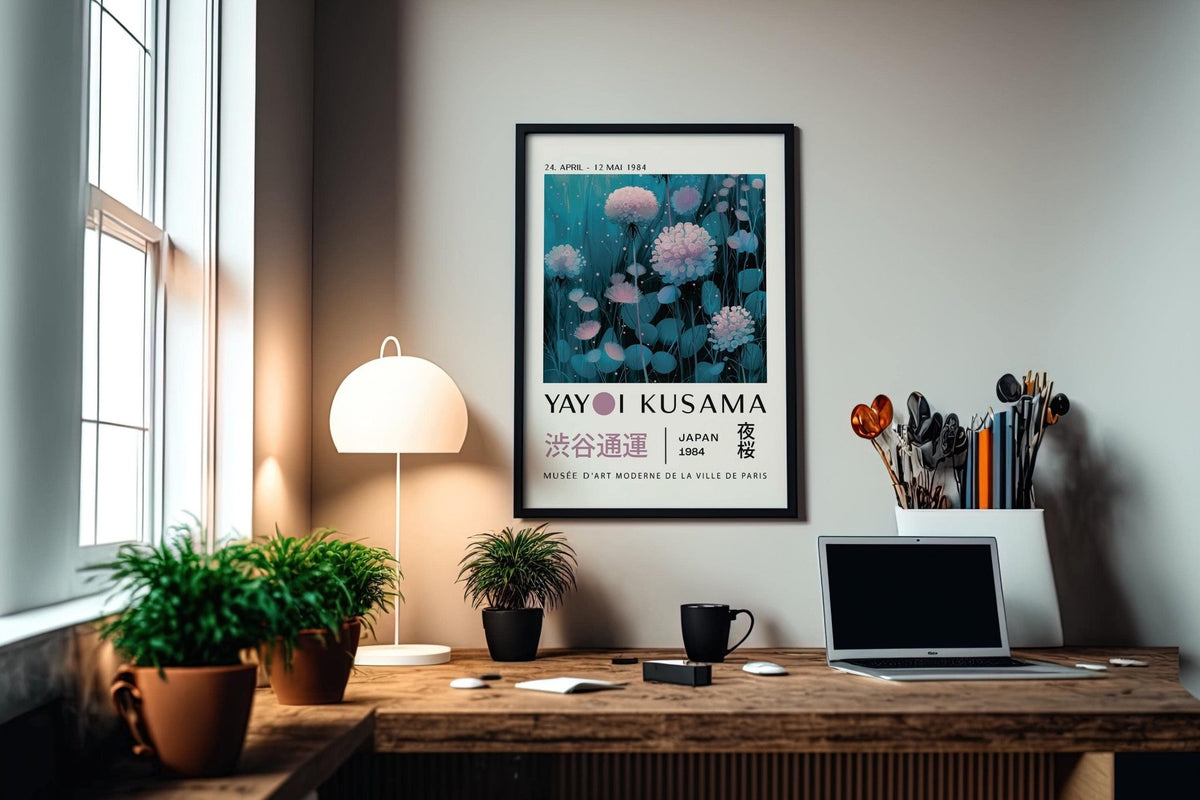 Blue and Purple Abstract Art framed print with pink flowers and leaves above a laptop on a wooden desk