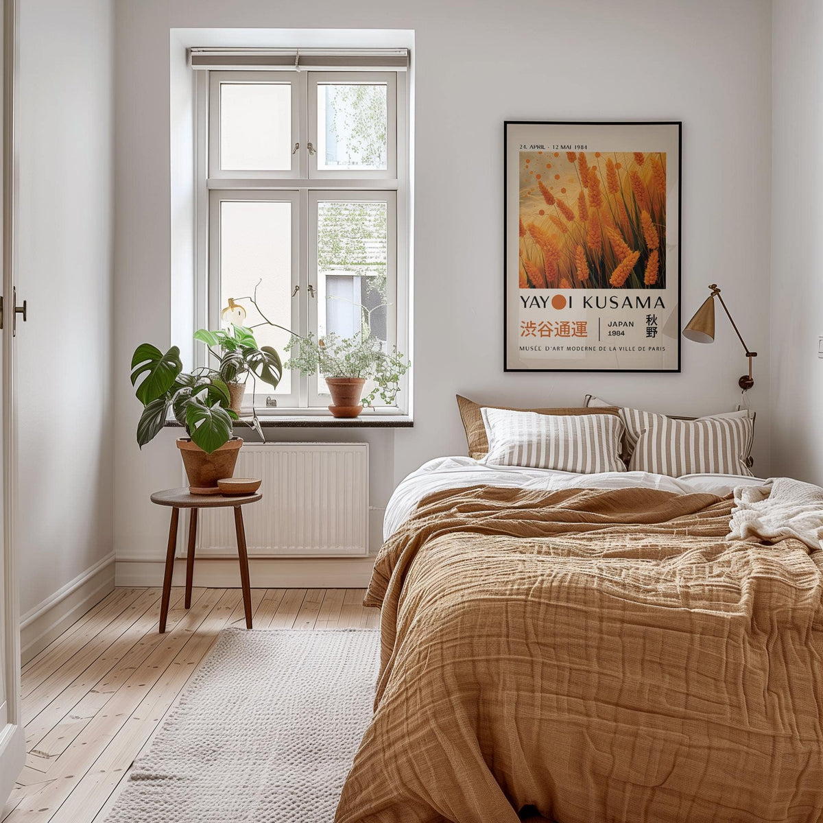 Autumnal wall art of wheat plants in orange and yellow tones above a beige bed in a bedroom