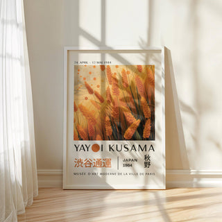Autumnal wall art leaning on a wooden floor with sunlight and shadows nearby