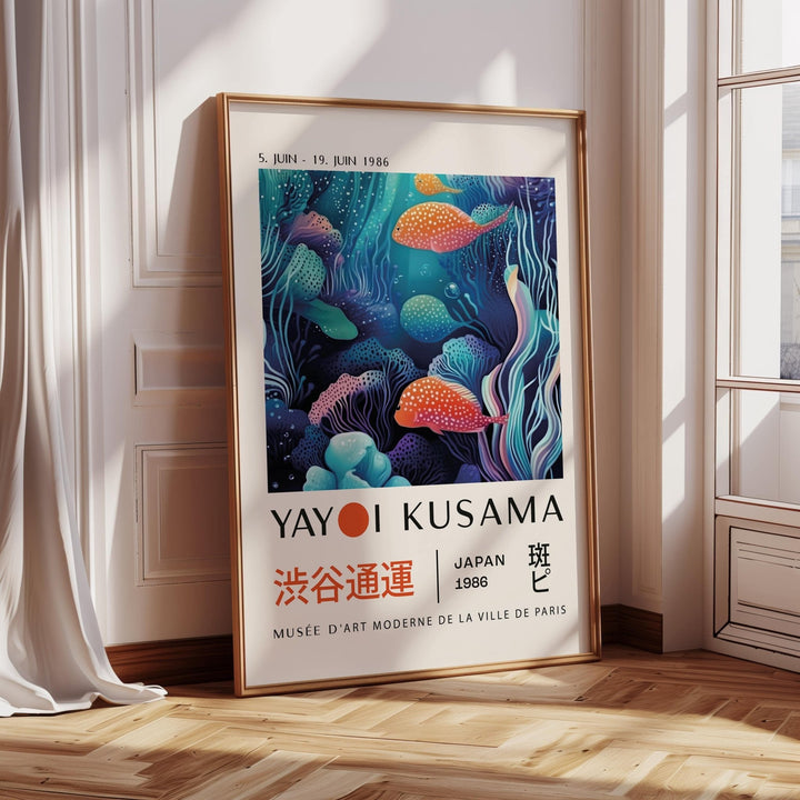 Colorful Fish Art print with vivid orange and blue spotted fish leaning on a wooden floor near a window