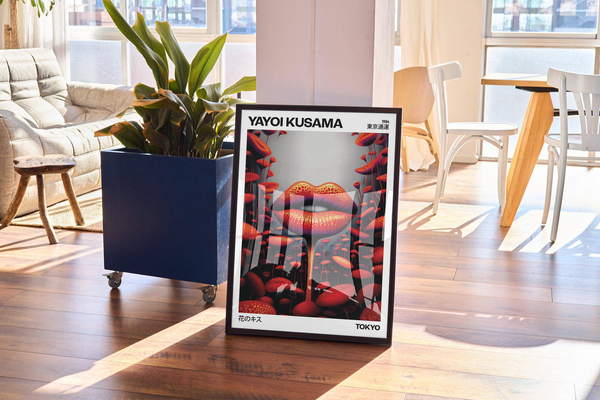 Print leaning on floor of strange wall art with red lips shaped like mushrooms in a sunlit dining area