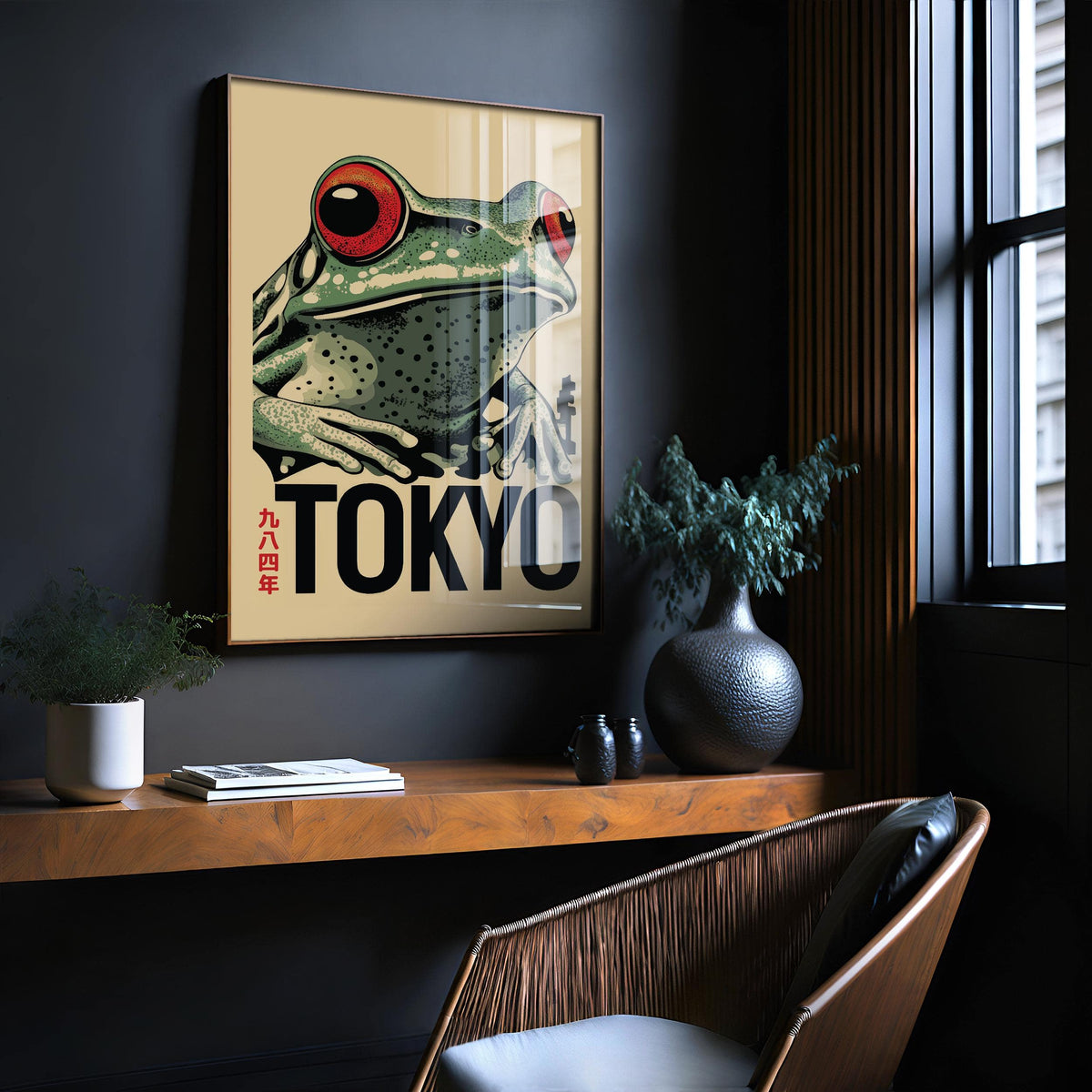 Frog poster framed print close-up showing a red-eyed frog with beige background on a dark wall above shelf with plants