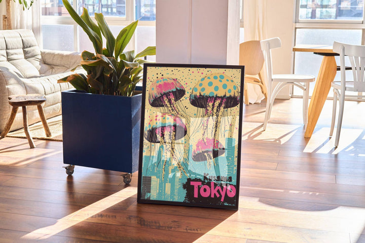 Framed Japan Retro Poster with pop-art jellyfish and city skyline leaning on a wooden floor near a blue plant pot