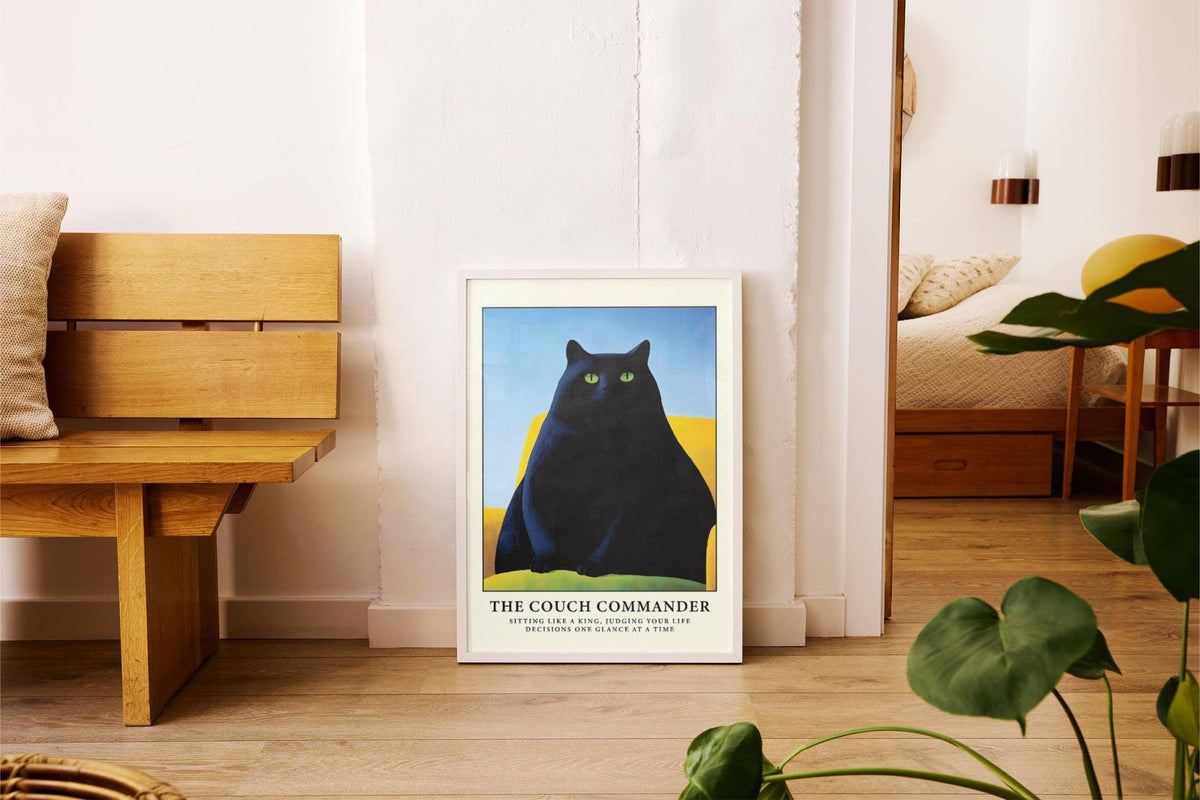 Cat Funny Poster leaning on floor showing black cat illustration with yellow couch and green cushion