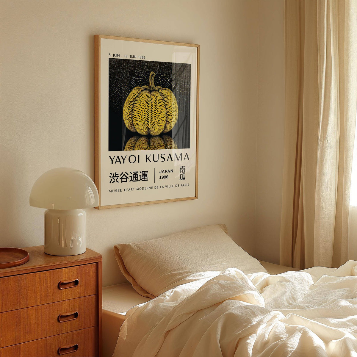 Mushroom wall art yellow polka dot pumpkin illustration in a bedroom above a wooden dresser