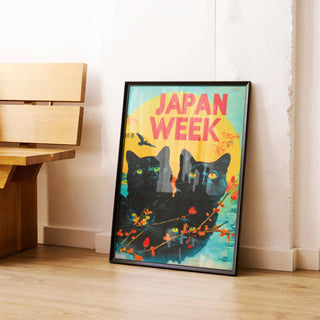 Retro wall prints leaning on floor with black cats and vibrant yellow orange background near wood bench