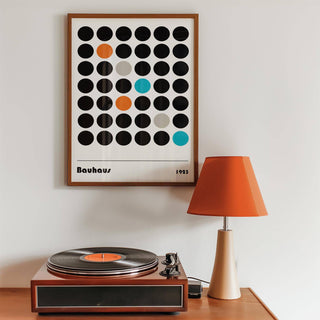 Graphic Prints framed print close-up with coloured dots and a record player and orange lamp beside it