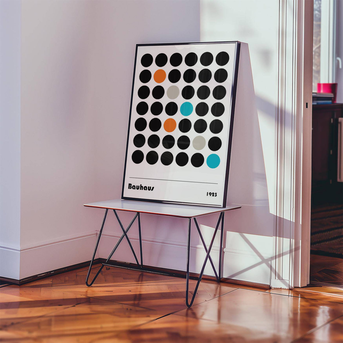 Graphic Prints leaning print with colored dots grid in Bauhaus minimalist style on a small table