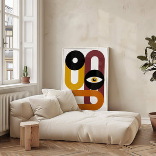 Retro Home Decor print leaning on floor behind cream sofa with cushions and a small plant on the right