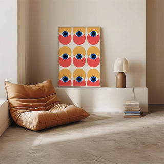 Wall Art Eye print leaning on a shelf with a brown and white lamp and a tan beanbag chair