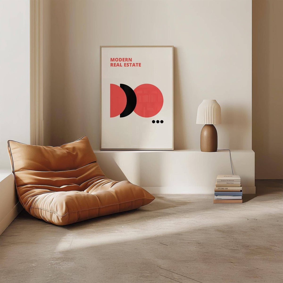 Red Black and White wall art with modern real estate text standing on a shelf beside a lamp and books