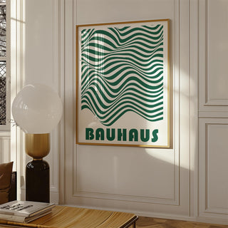 Green and white wall art with wavy bauhaus stripes in a room near a lamp on a table