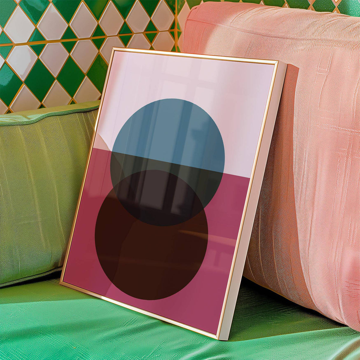 Print leaning on a green couch showing overlapping circles in dark teal and brown on a purple and pink background