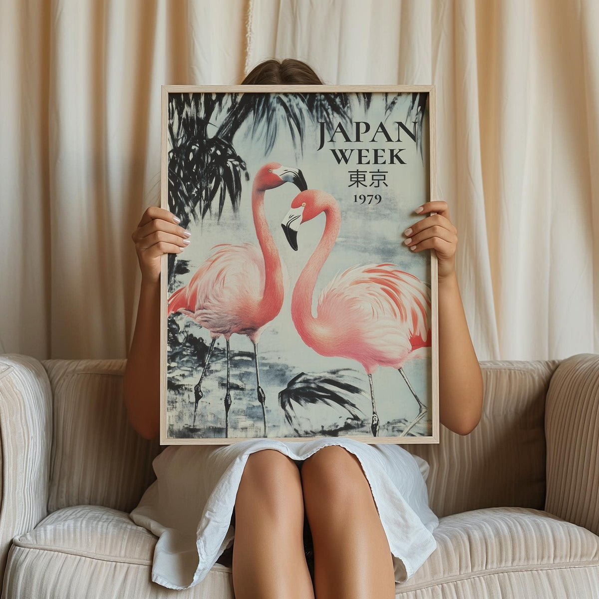 Prints of Flamingos held in hands showing two pink flamingos with vintage style and text on a light background