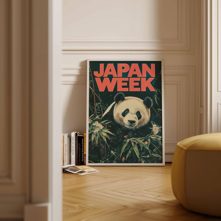 Print leaning on floor showing Japanese Panda Art with a giant panda and bamboo surrounded by books and a yellow seat