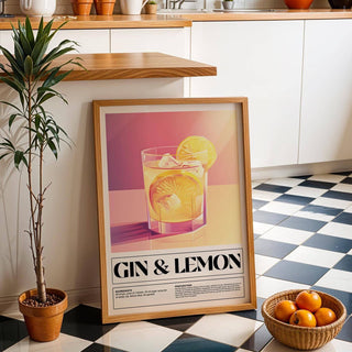 Bar wall decor of a gin and lemon cocktail illustration leaning on kitchen floor near a potted plant and basket of oranges