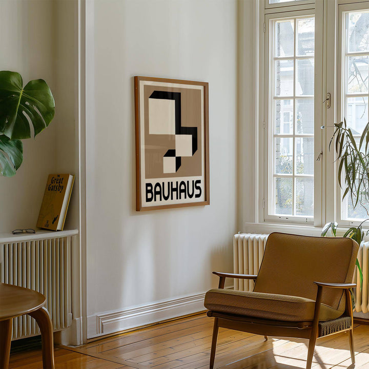 Geometric wall hanging with black and white blocks and beige background above a radiator