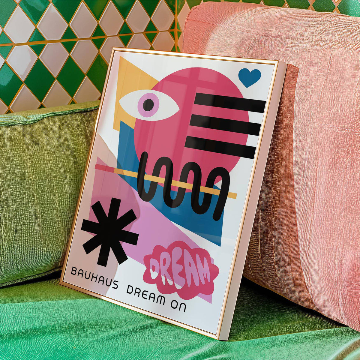 Framed Maximalist Wall Art with abstract eye and shapes leaning on pink and green cushions