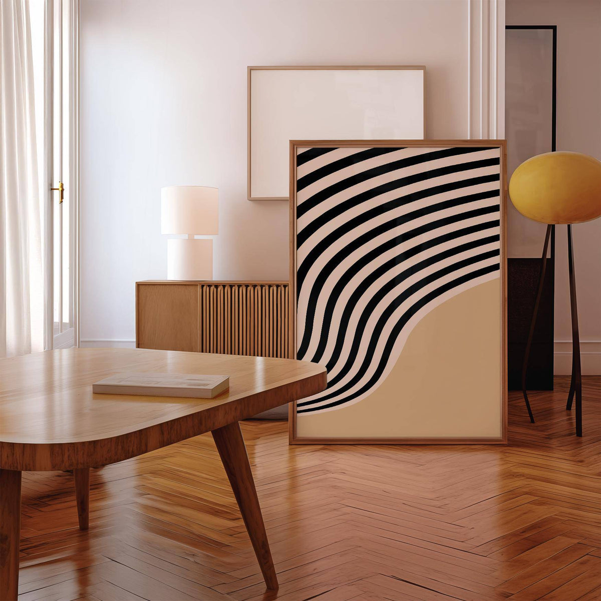 Beige Abstract Art print with black curved stripes leaning on floor lamp in a modern room