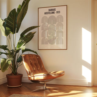 Bauhaus Minimalism Art print with black line arches on a wall above a brown leather chair