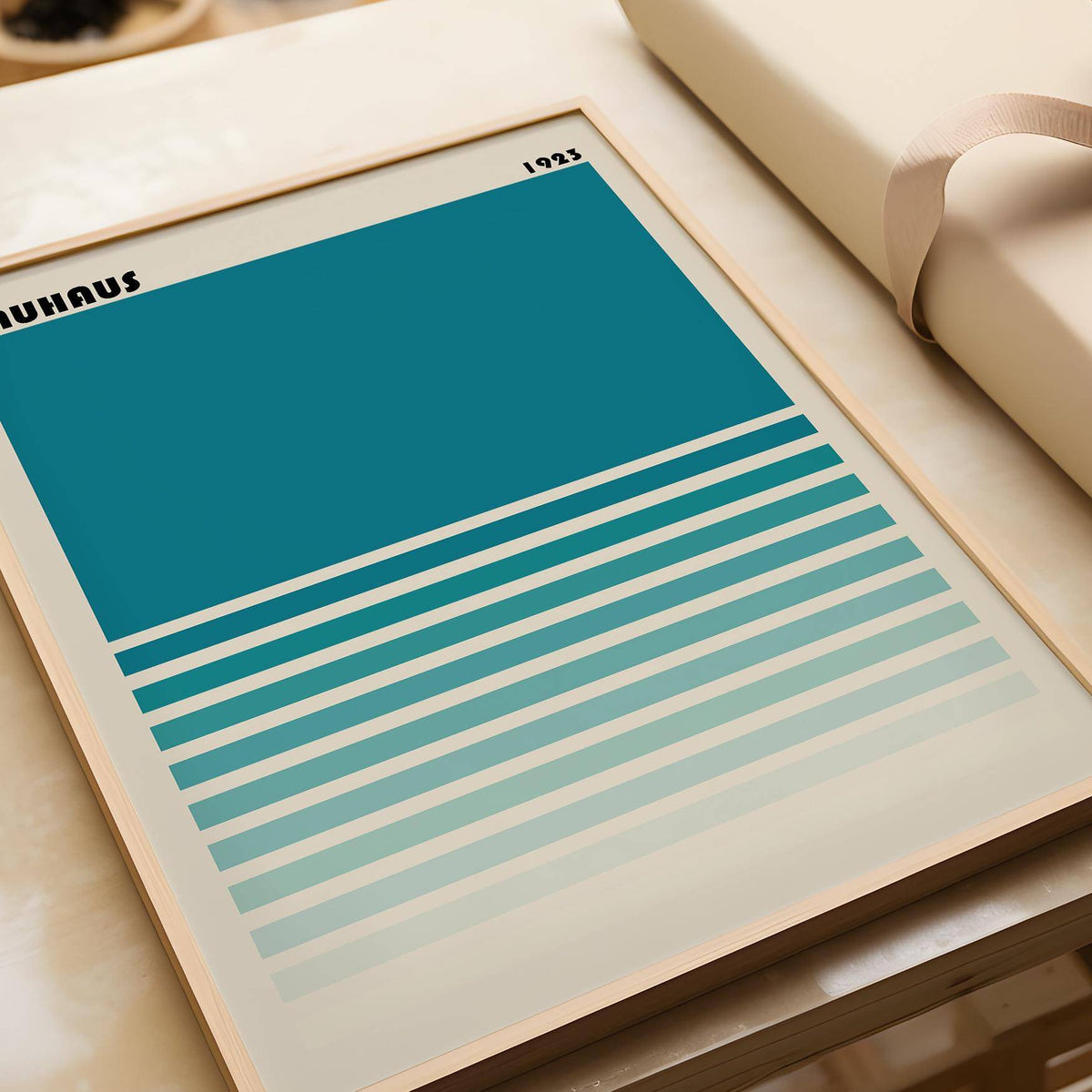 Framed close-up of Teal Blue Gradient Wall Art showing blue and teal horizontal stripes on a beige background