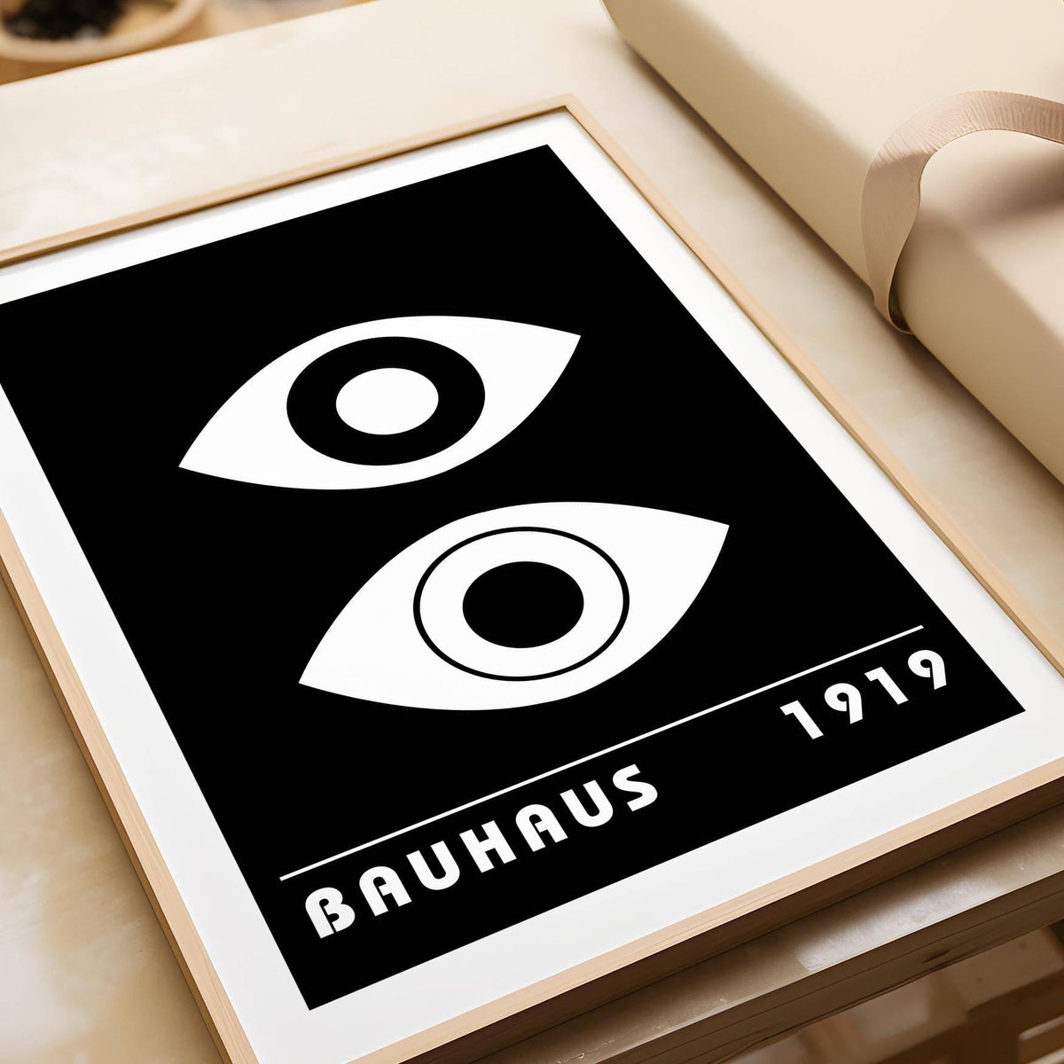 Close-up of Eye Art print with two abstract eyes in black and white near wrapping paper