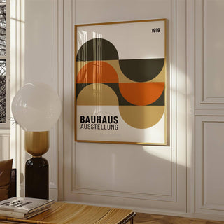 Artwork for the Wall framed print of abstract geometric shapes in earthy tones with a lamp nearby