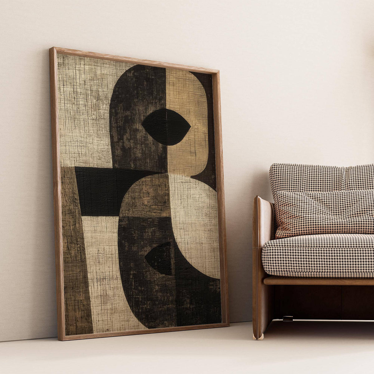 Large Owl Wall Art leaning on the floor with a brown patterned sofa beside it in soft natural light