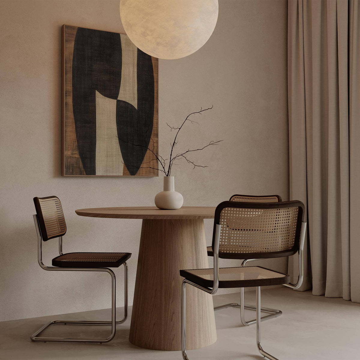 Zen wall art with abstract dark and beige organic shapes above a dining table with two chairs