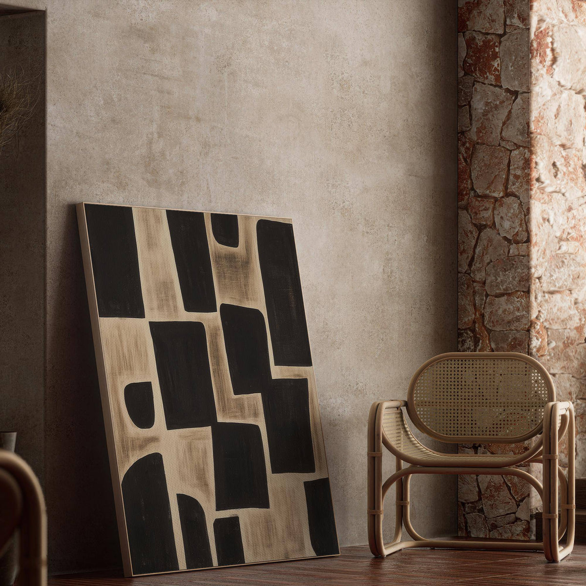 Wabi Sabi Artwork leaning on a textured wall beside a woven chair in earthy natural colours