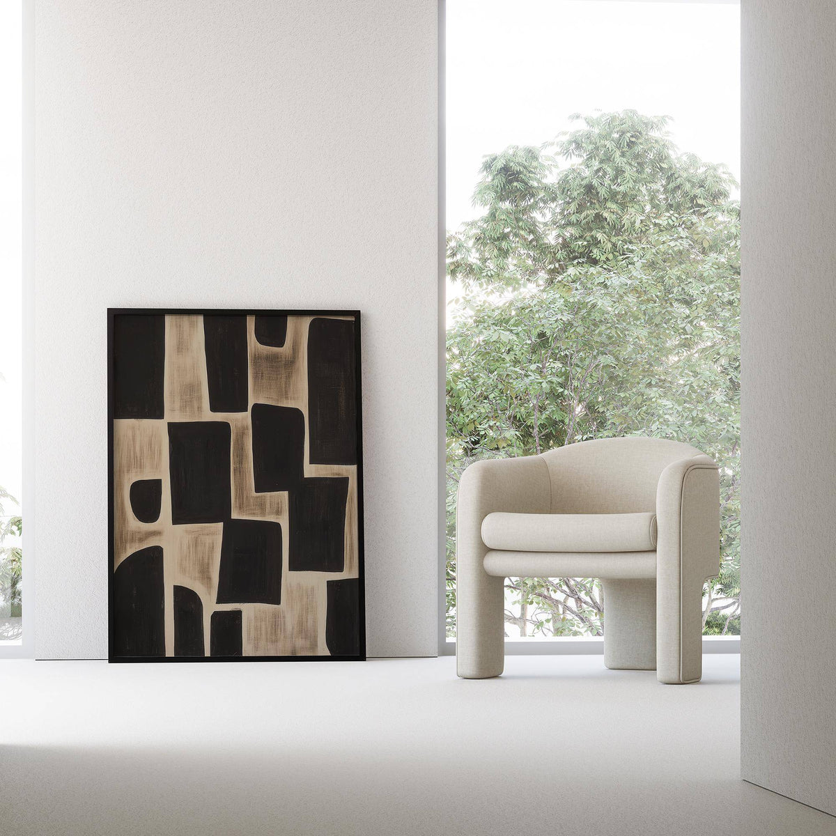 Print leaning on a floor next to a beige curved armchair showing black abstract shapes on a beige background