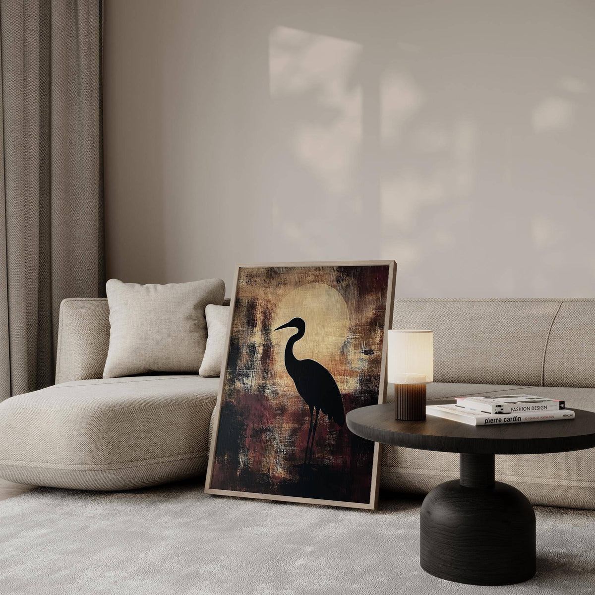 Print leaning on a shelf showing large heron wall art with abstract brown and beige tones next to a sofa and lamp