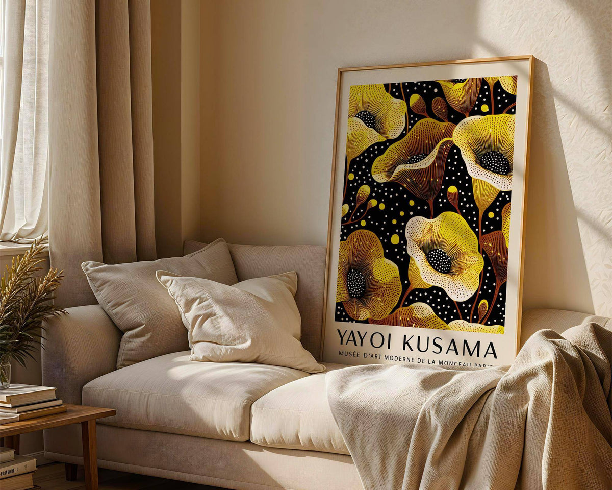 Yellow wall decor print leaning on sofa with beige cushion and soft light