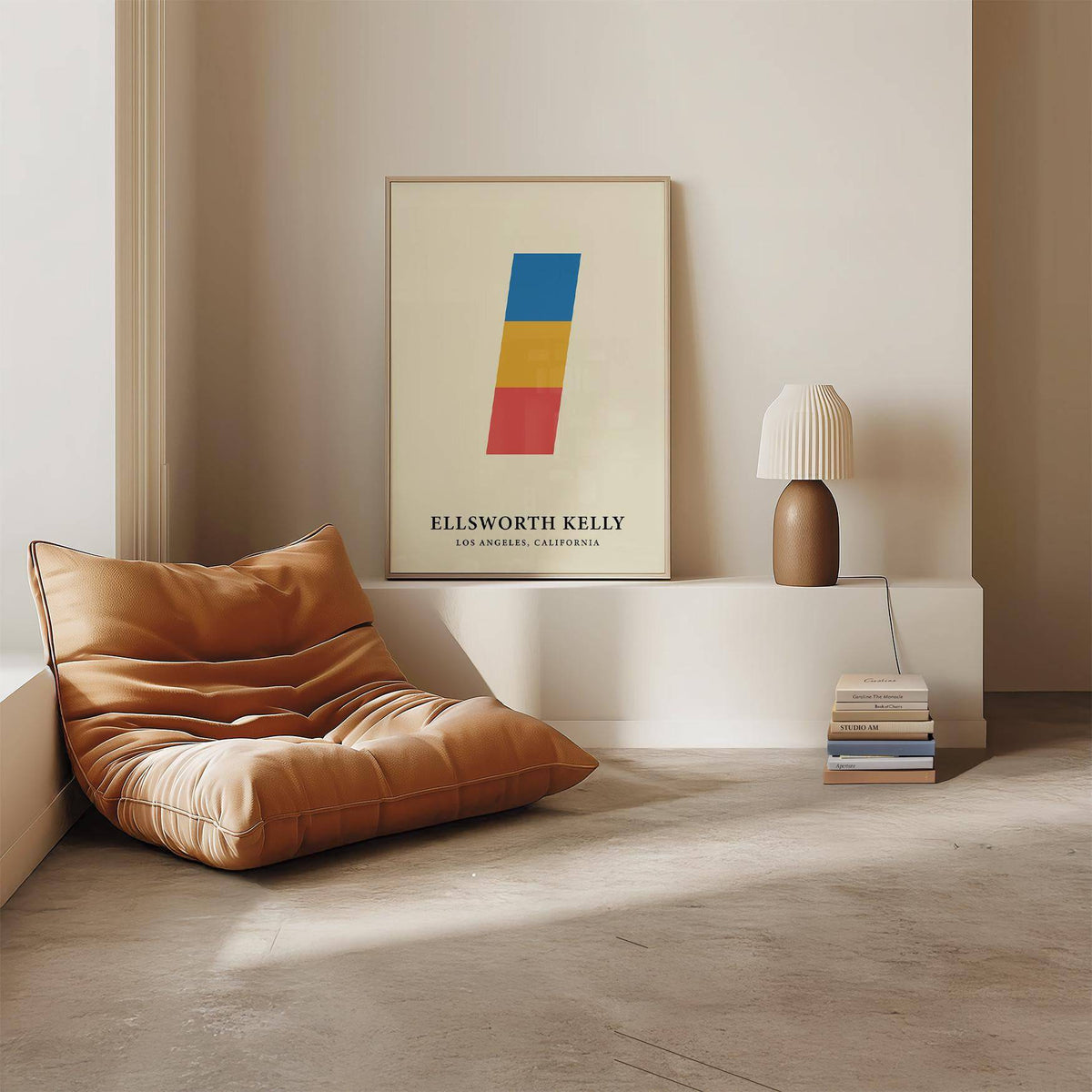 Creative wall art with stacked blue, yellow and red blocks leaning on a shelf next to a lamp and chair