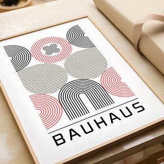 Wall art for Home Office with abstract geometric shapes in black beige and red near gift wrapping
