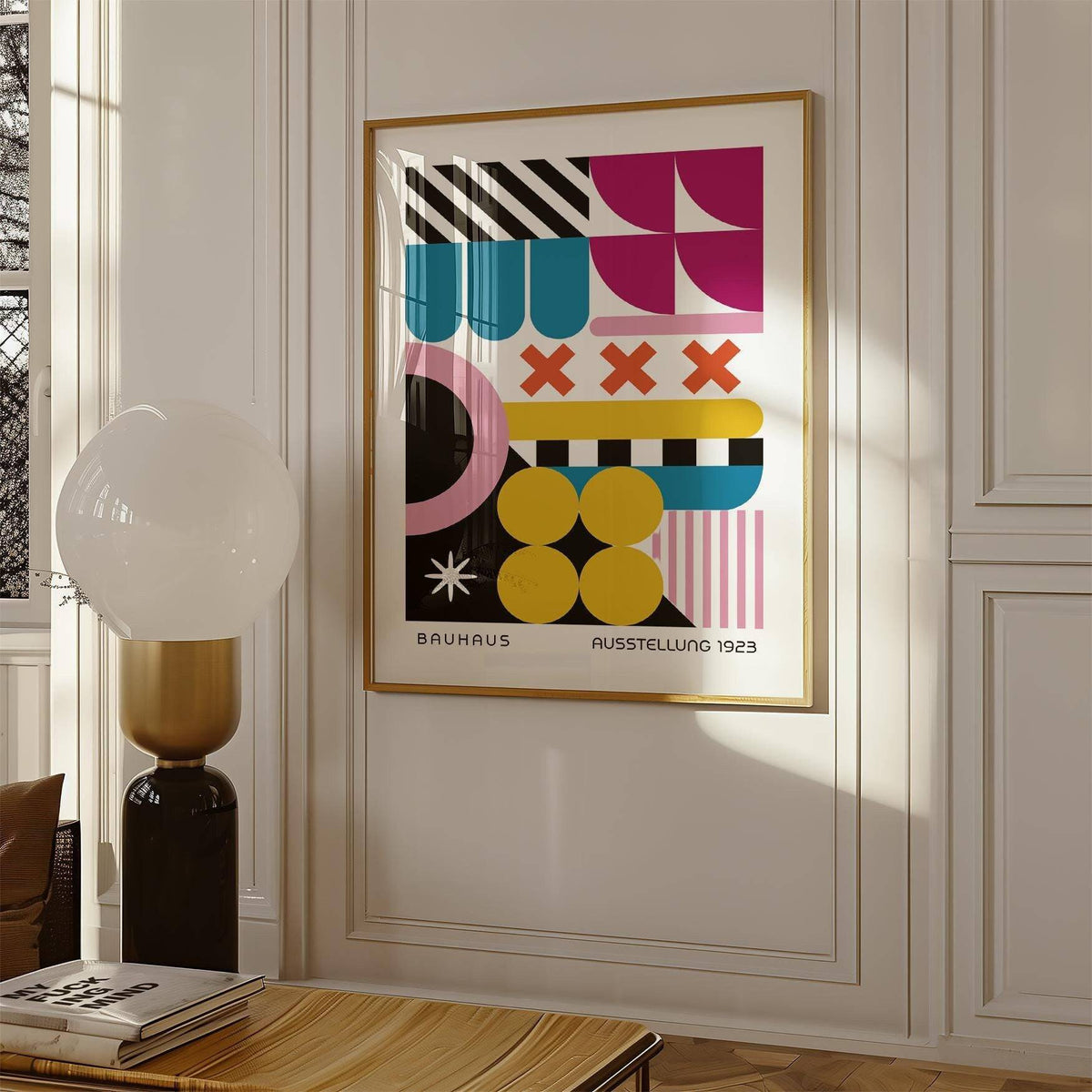 Colorful Prints framed print with geometric shapes in bold colours beside a table lamp