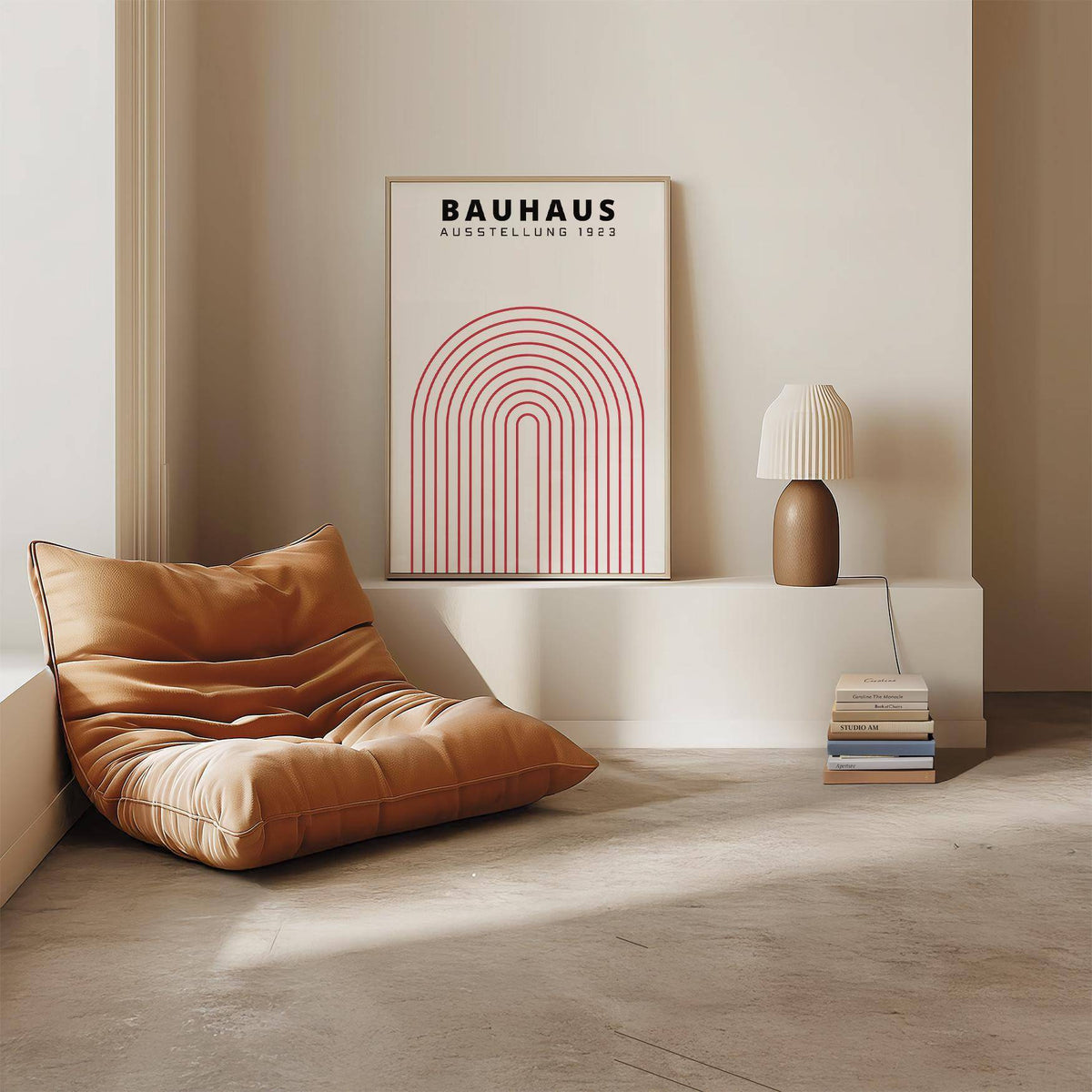 Original Bauhaus Poster leaning on a ledge with red concentric arch lines and a lamp beside it