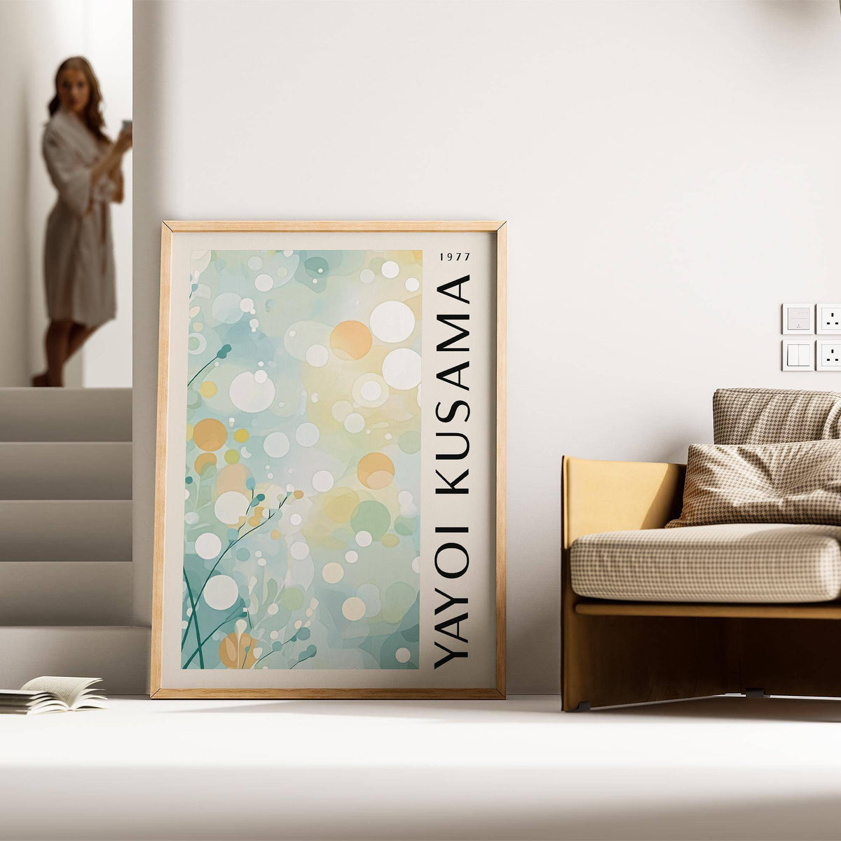 Light Blue Wall Decor leaning on floor near a sofa with light pastel abstract floral dots