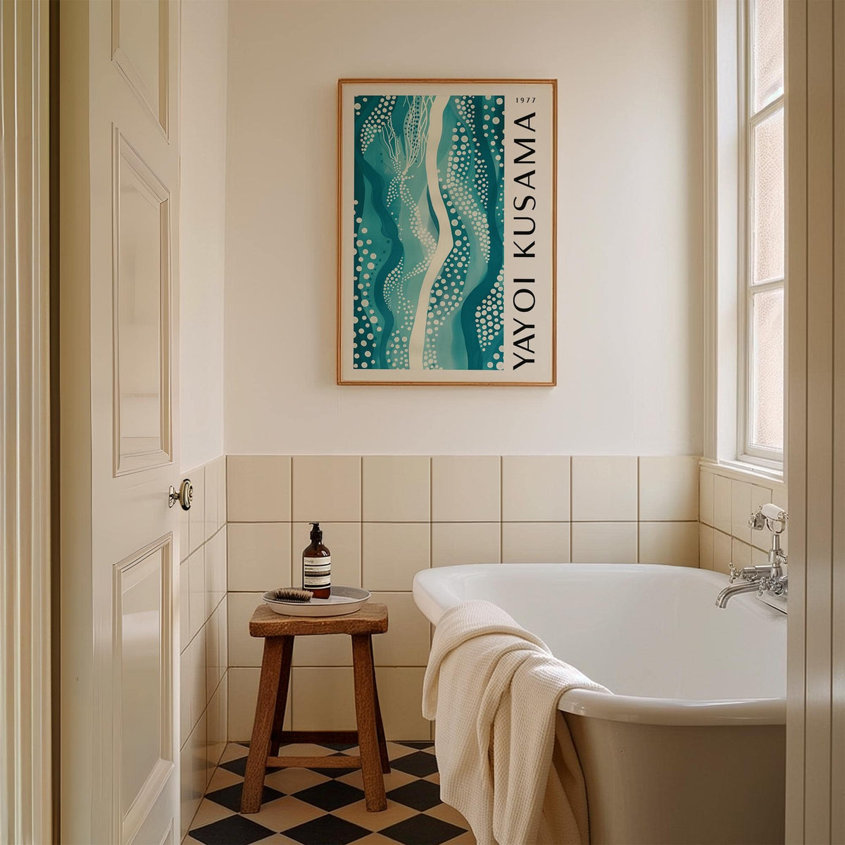 Abstract picture on the bathroom wall above a wooden stool with a bottle and tray