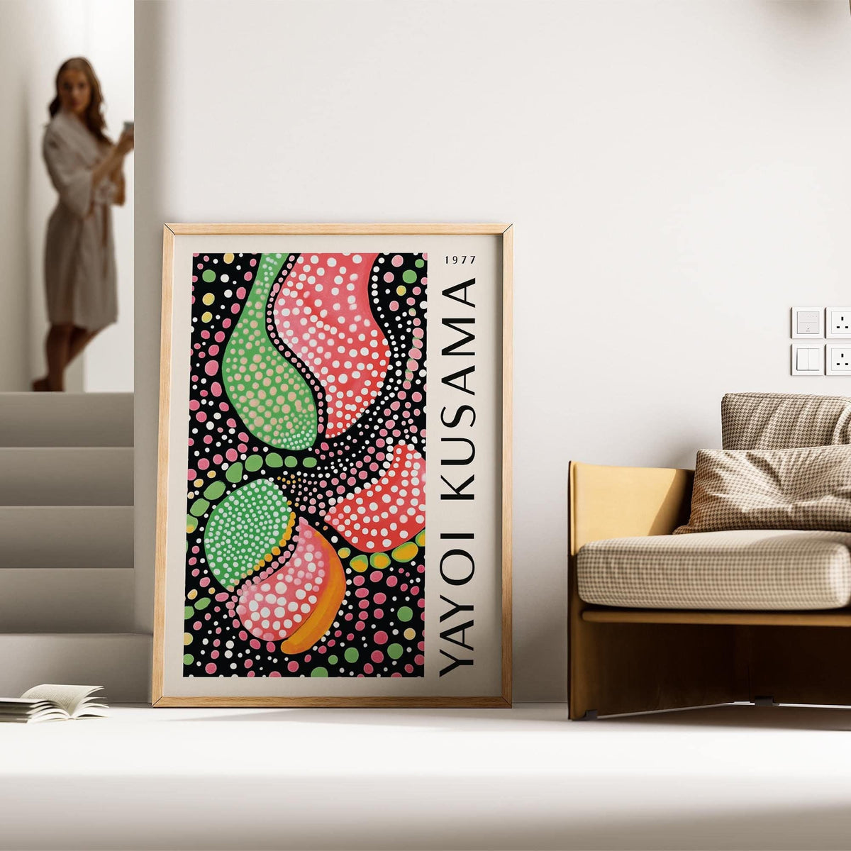 Abstract Shapes wall art print with colourful dotted abstract shapes leaning against the wall by a sofa